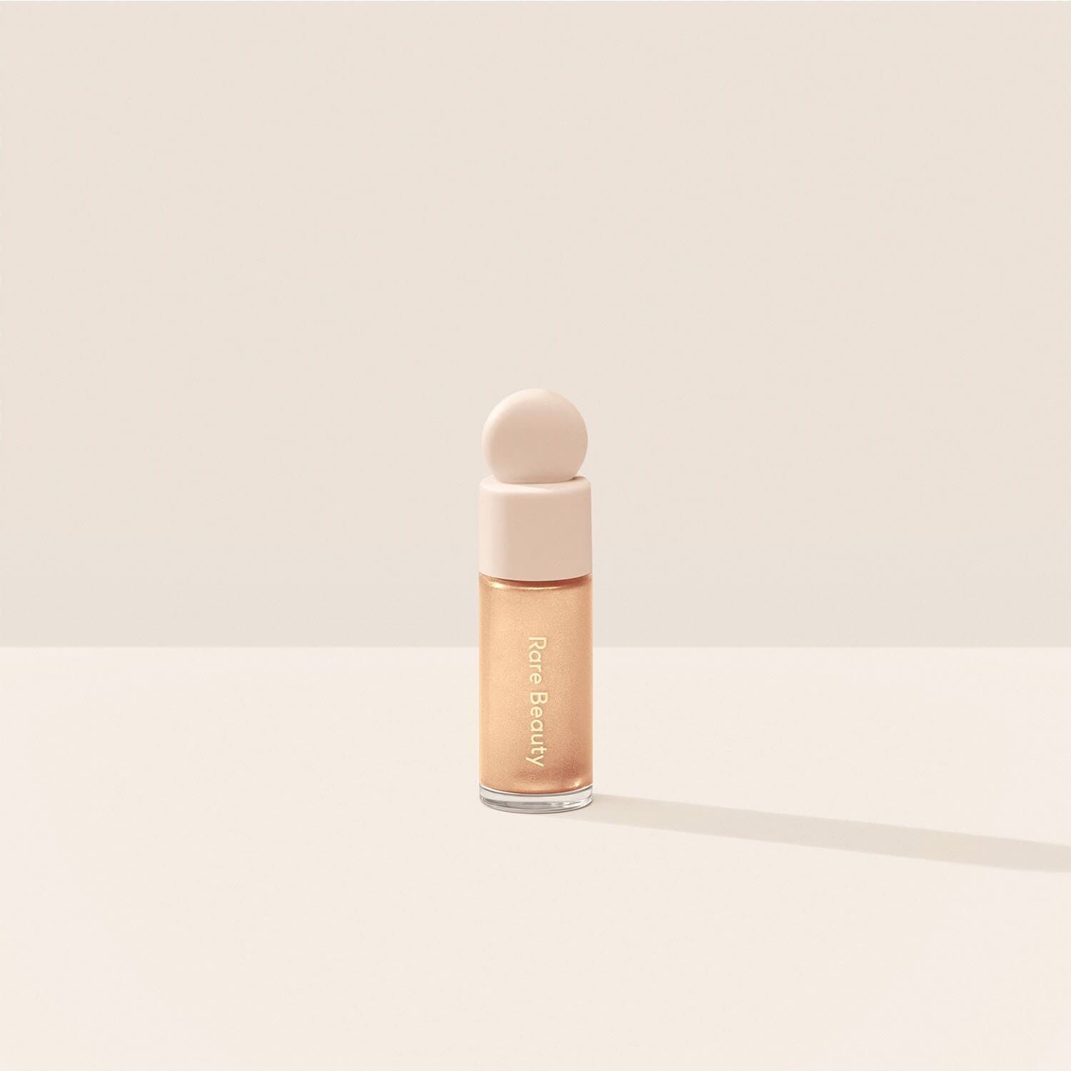 Positive Light Highlighter Mini illuminante liquido di RARE BEAUTY ≡ SEPHORA